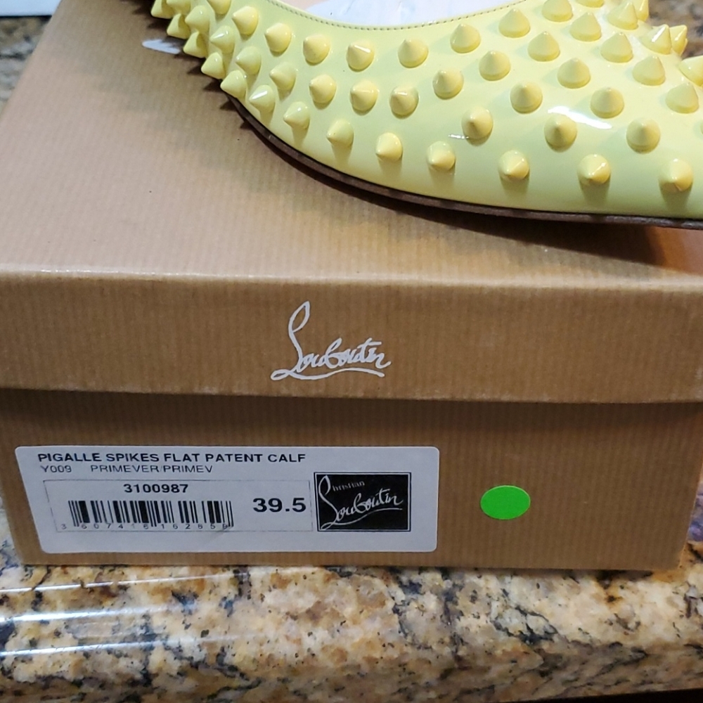 Yellow christian louboutin flats